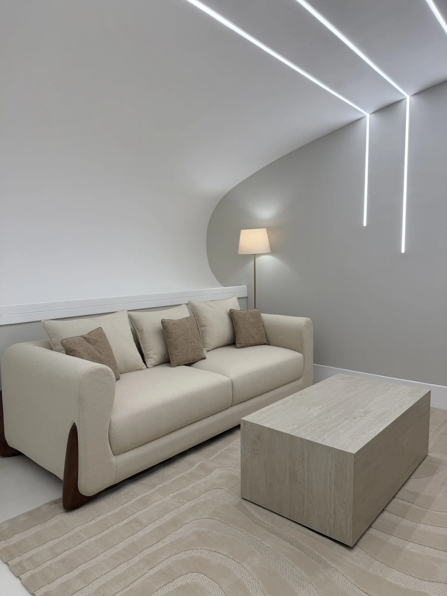 Custom cream sofa in a hospitality lounge by Time Furniture