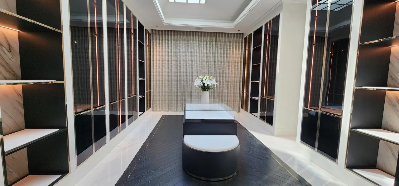 Time Furniture Jumeirah Islands dressing room with illuminated glass wardrobe shutters
