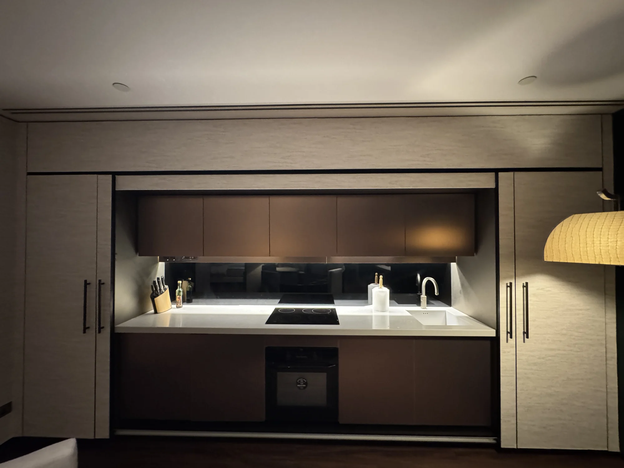 Pocket-door appliance pantry with internal storage built by Time Furniture