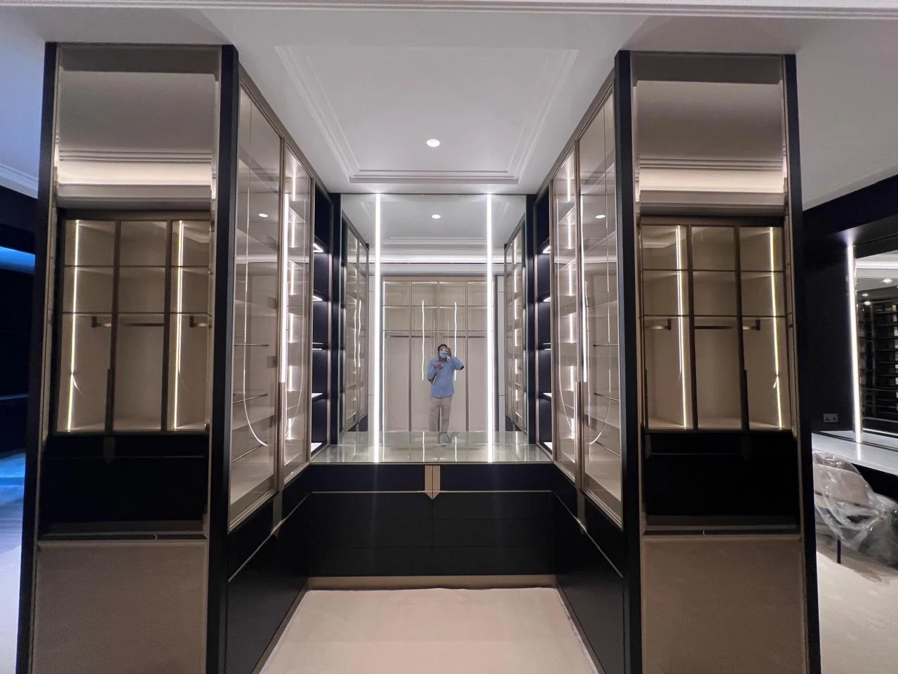 Mirrored walk-in dressing corridor built by Time Furniture