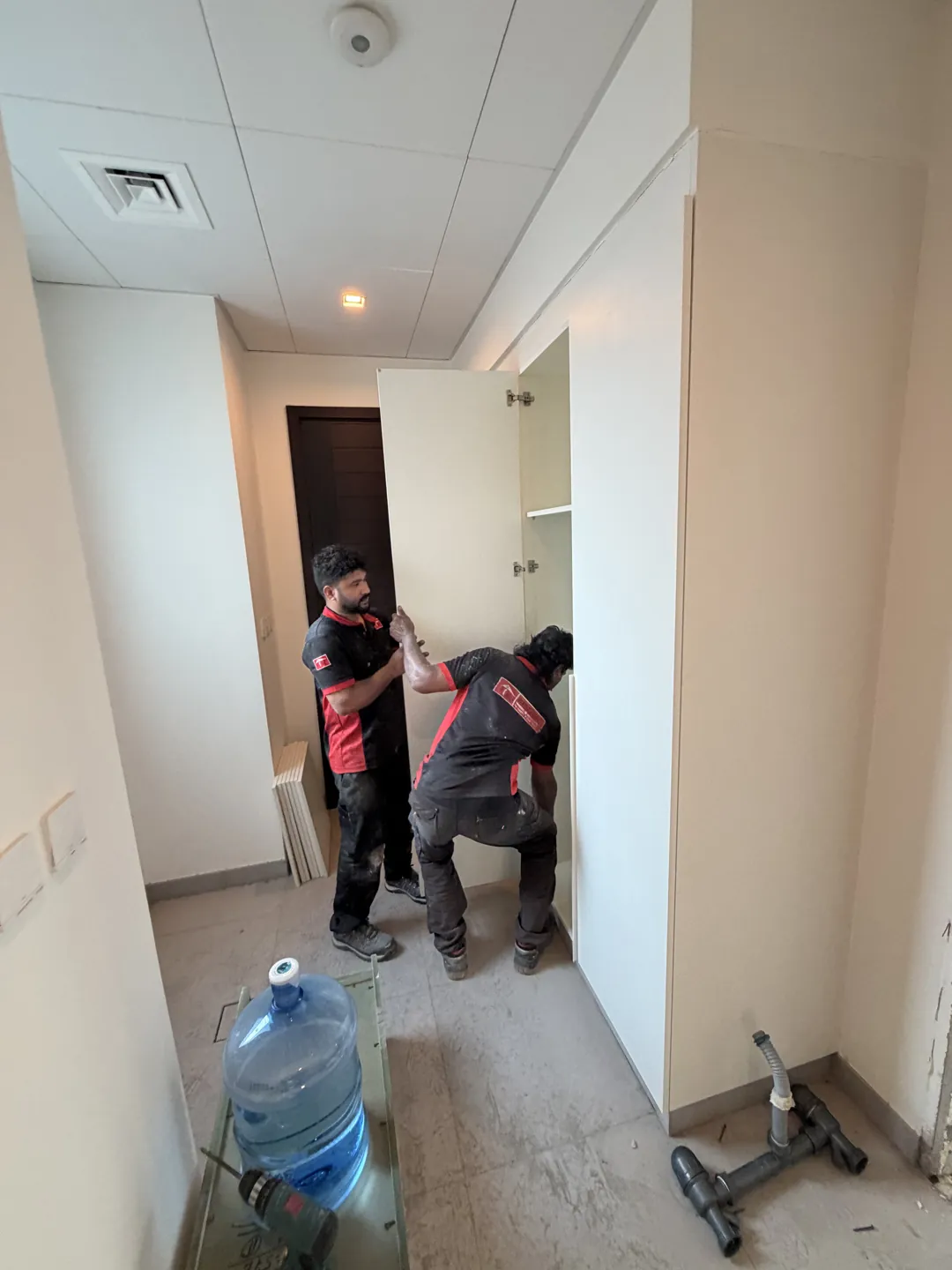 Time Furniture installation team completing interior finishing work